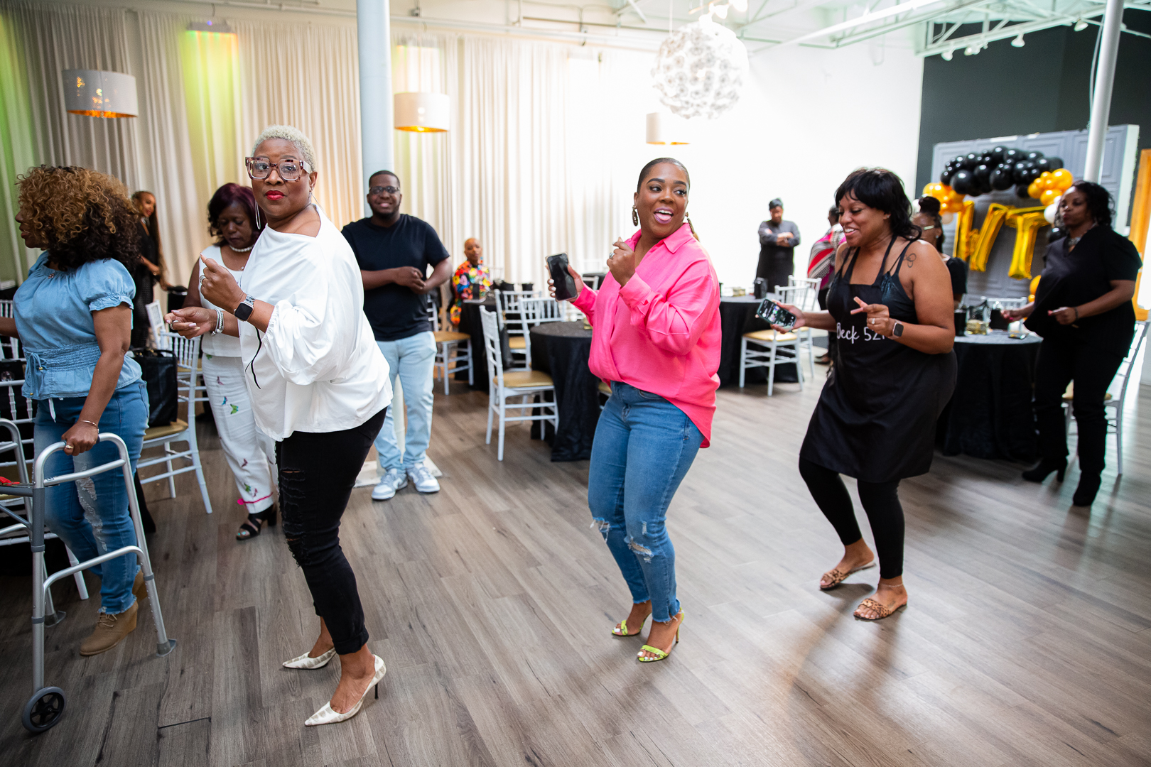 Chat & Chew guests dancing together