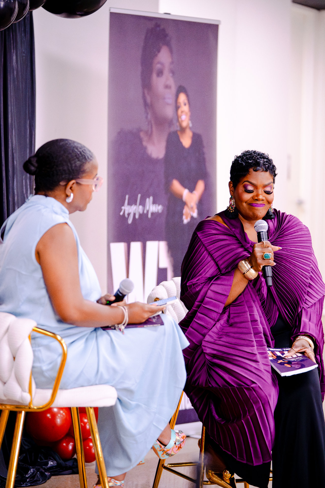 Angela in conversation on stage at Chat & Chew