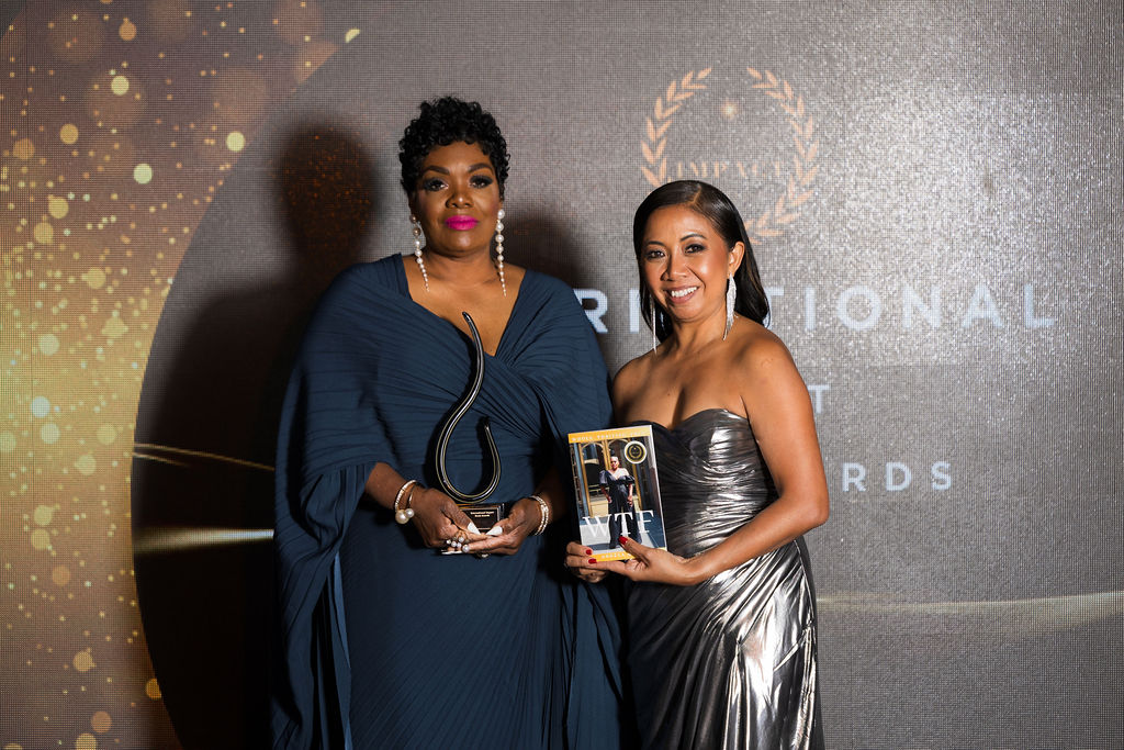 Angela accepting an international book award